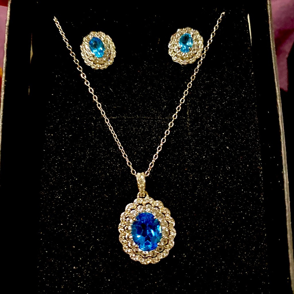 Beautiful Blue Topaz & White Sapphire stones ( lab created )set sterling silver